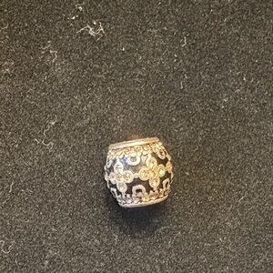 Brighton black and gold cross style charm bracelet piece